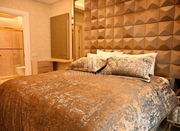 Elegant 2 + 1 apartment with designer interior in a new luxury residence in Mahmutlar ID-9630 фото-12