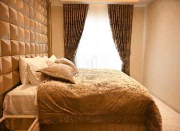 Elegant 2 + 1 apartment with designer interior in a new luxury residence in Mahmutlar ID-9630 фото-13