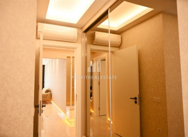 Elegant 2 + 1 apartment with designer interior in a new luxury residence in Mahmutlar ID-9630 фото-15