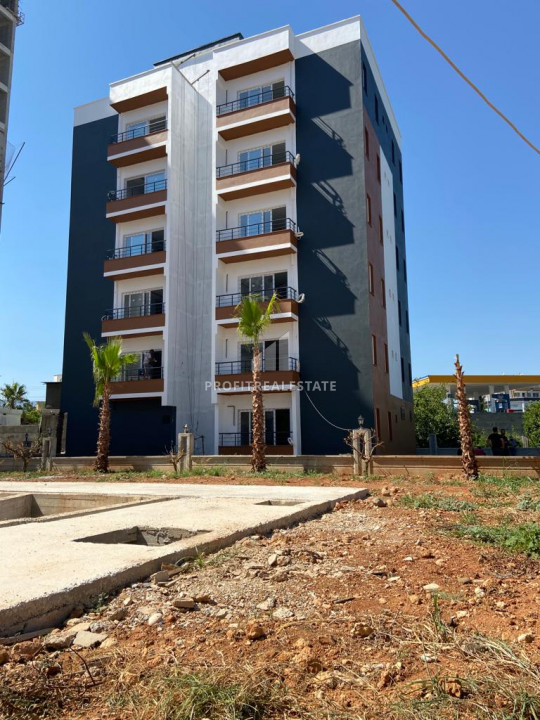One-bedroom apartment, 40m², in a new residence 350 meters from the center of Tece, Mersin ID-9641 фото-1