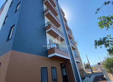 One-bedroom apartment, 40m², in a new residence 350 meters from the center of Tece, Mersin ID-9641 фото-2