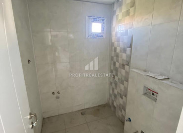 One-bedroom apartment, 40m², in a new residence 350 meters from the center of Tece, Mersin ID-9641 фото-7