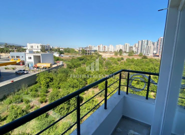 One-bedroom apartment, 40m², in a new residence 350 meters from the center of Tece, Mersin ID-9641 фото-9
