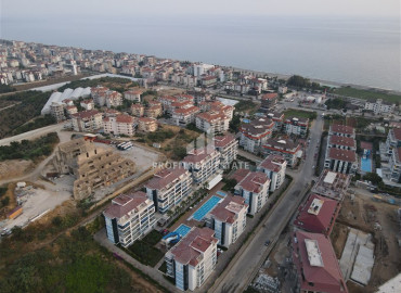 Ready to move in, 2+1 apartment in a luxury residence 300m from the sea in the Kestel area 370x270 }}