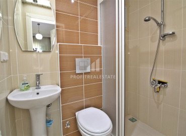 Furnished two bedroom apartment in a residence with facilities, 500 meters from the sea in Mahmutlar ID-9718 фото-13