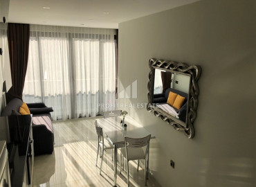 Двухуровневая квартира с одной спальней, на первой береговой линии и в 50 метрах от центра Махмутлара, Аланья ID-9719 фото-3