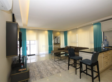 Меблированная квартира с двумя спальнями в новом элитном комплексе в 200м от моря в районе Каргыджак ID-9725 фото-4