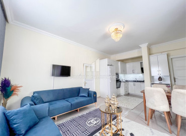 Меблированная квартира с одной спальней, 65м², в резиденции на первой береговой линии в Махмутларе, Алания ID-9730 фото-1
