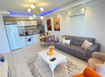 Меблированная двухкомнатная квартира, 70м², на высоком этаже в Махмутларе с видом на море и горы ID-9773 фото-3