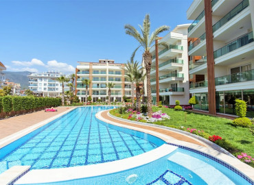 Spacious two-bedroom apartment, equipped with furniture and appliances, in a well-maintained residential residence in Oba, Alanya, 120 m2 ID-9787 фото-1