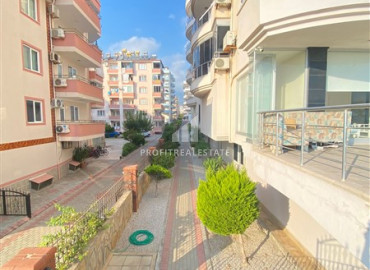 Large furnished 2 + 1 view apartment on the first coastline in Mahmutlar ID-9841 фото-5