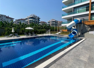 New apartment 2 + 1, 115m², in a luxury residence on the beach in Kestel, Alanya ID-9878 фото-1