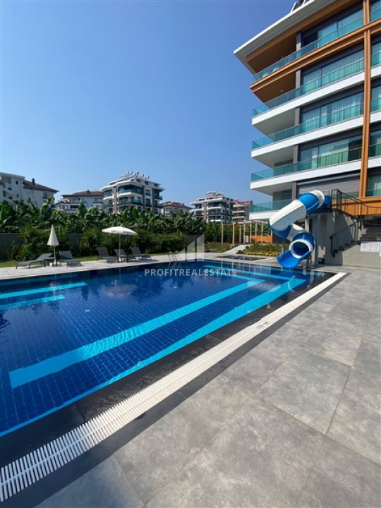 Новая квартира 2+1, 115м², в элитном комплексе на берегу моря в районе Кестель, Аланья ID-9878 фото-1