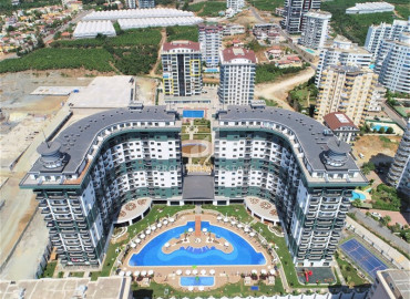 Новая квартира 2+1, 100м², в элитном комплексе близко к морю в Махмутларе ID-9895 фото-9