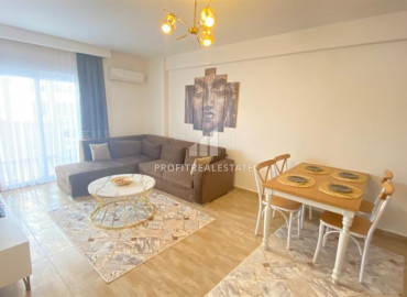 One bedroom apartment, equipped with furniture and appliances, in the center of Mahmutlar, Alanya, 65 m2 ID-10023 фото-2