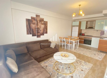 One bedroom apartment, equipped with furniture and appliances, in the center of Mahmutlar, Alanya, 65 m2 ID-10023 фото-3