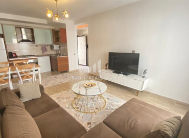 One bedroom apartment, equipped with furniture and appliances, in the center of Mahmutlar, Alanya, 65 m2 ID-10023 фото-4