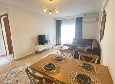 One bedroom apartment, equipped with furniture and appliances, in the center of Mahmutlar, Alanya, 65 m2 ID-10023 фото-6