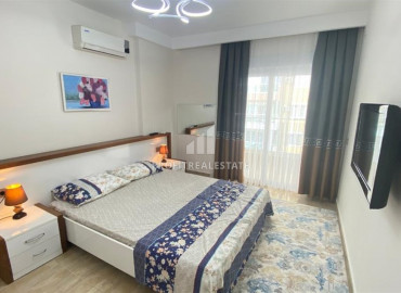 One bedroom apartment, equipped with furniture and appliances, in the center of Mahmutlar, Alanya, 65 m2 ID-10023 фото-8