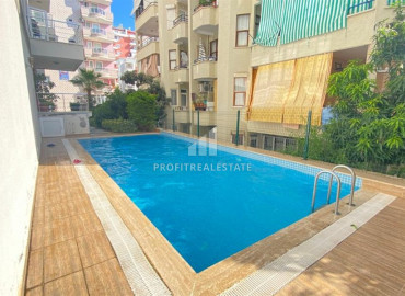 One bedroom apartment, equipped with furniture and appliances, in the center of Mahmutlar, Alanya, 65 m2 ID-10023 фото-18
