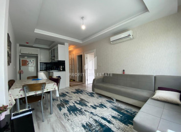 Двухкомнатная квартира, 55м², с видом на море в новом комплексе в районе Томюк, Мерсин ID-10027 фото-4
