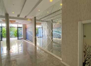 Двухкомнатная квартира, 55м², с видом на море в новом комплексе в районе Томюк, Мерсин ID-10027 фото-17