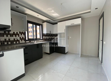 Two bedroom apartment in a new gasified residence with a swimming pool, by the sea in Tece, Mersin ID-10055 фото-2