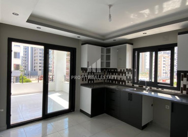 Two bedroom apartment in a new gasified residence with a swimming pool, by the sea in Tece, Mersin ID-10055 фото-3