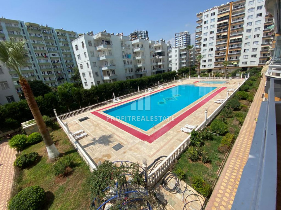 Furnished two-bedroom apartment in a residence with a swimming pool 150m from the sea in Mersin - Tece ID-10056 фото-1