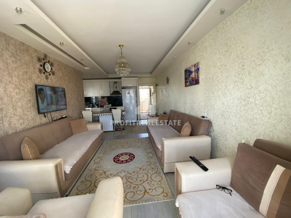 One-bedroom apartment, 60m², with sea view in Tomuk area, Mersin ID-10057 фото-2