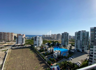One-bedroom apartment, 60m², with sea view in Tomuk area, Mersin ID-10057 фото-18