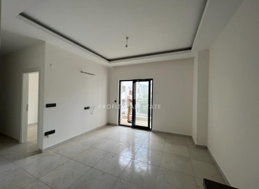 Новые апартаменты, с одной спальней, в чистовой отделке, в 300 метрах от центра Махмутлара, Аланья 55 м2 ID-10061 фото-5
