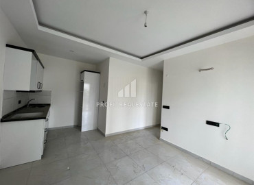 Новые апартаменты, с одной спальней, в чистовой отделке, в 300 метрах от центра Махмутлара, Аланья 55 м2 ID-10061 фото-6}}
