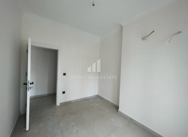 Новые апартаменты, с одной спальней, в чистовой отделке, в 300 метрах от центра Махмутлара, Аланья 55 м2 ID-10061 фото-11
