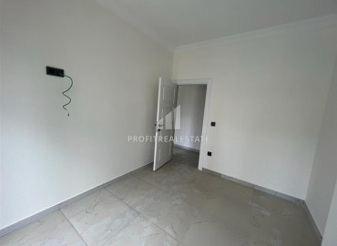 Новые апартаменты, с одной спальней, в чистовой отделке, в 300 метрах от центра Махмутлара, Аланья 55 м2 ID-10061 фото-12}}