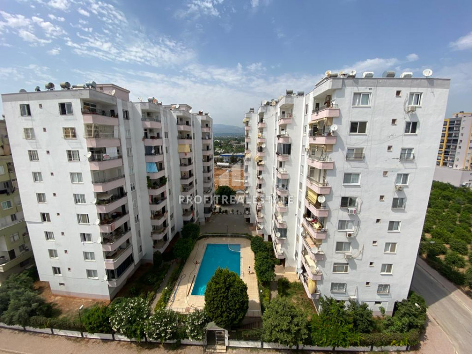 Two-bedroom apartment, 110m², on a high floor 150m from the sea in Tomuk area, Mersin ID-10075 фото-1
