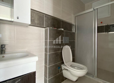 Two-bedroom apartment, 110m², on a high floor 150m from the sea in Tomuk area, Mersin ID-10075 фото-8