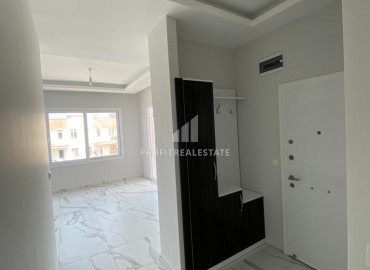 Two-bedroom apartment, 110m², on a high floor 150m from the sea in Tomuk area, Mersin ID-10075 фото-9