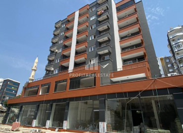 Two bedroom apartment, 90m², in a new residence with minimal facilities, in the area of Mersin - Soli ID-10098 фото-1