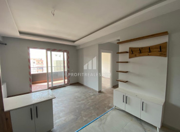 Two bedroom apartment, 90m², in a new residence with minimal facilities, in the area of Mersin - Soli ID-10098 фото-5