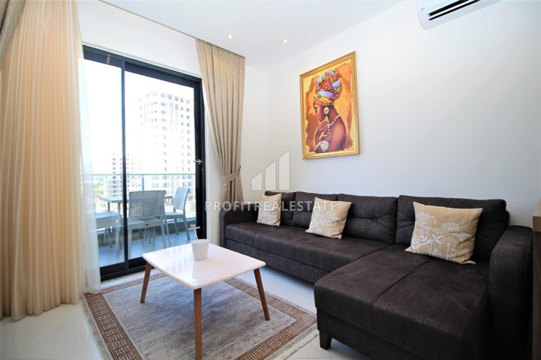 Уютная двухкомнатная квартира в новом элитном комплексе в 150м от центра Махмутлара ID-10105 фото-2
