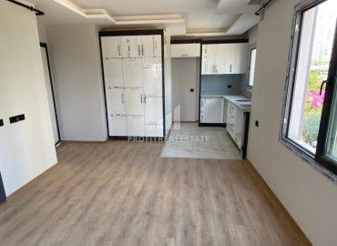 Апартаменты с одной спальней,50м², в новом комплексе в центре района Мезитли, Мерсин ID-10125 фото-2