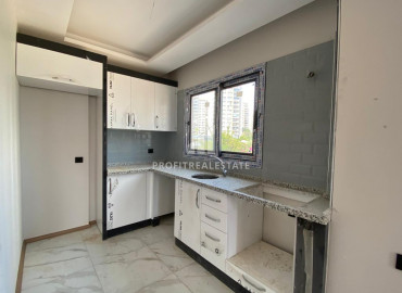 Апартаменты с одной спальней,50м², в новом комплексе в центре района Мезитли, Мерсин ID-10125 фото-3