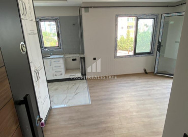 Апартаменты с одной спальней,50м², в новом комплексе в центре района Мезитли, Мерсин ID-10125 фото-6