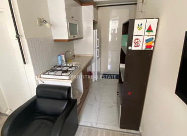 Center of Mersin, Yenisehir: furnished one-bedroom apartment, 50m², at an attractive price ID-10126 фото-4}}