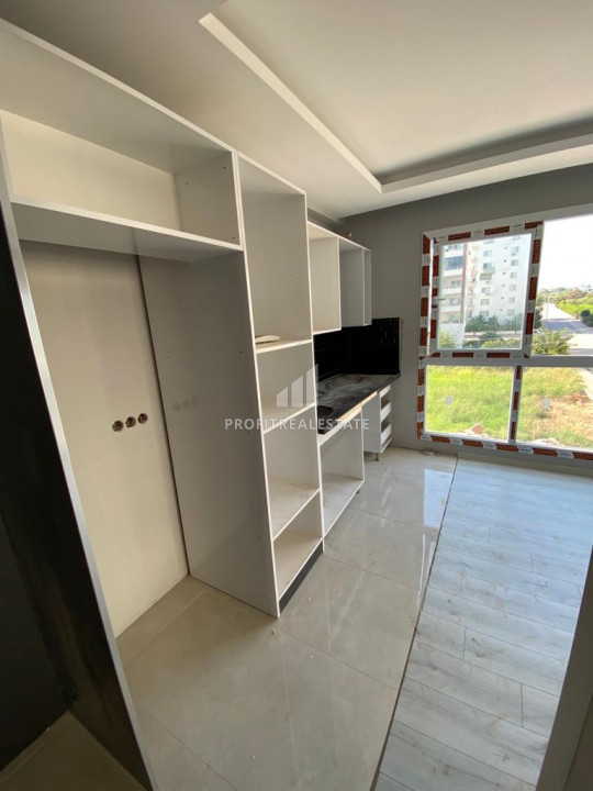 Квартира с одной спальней, 50м², в новом комплексе в районе Томюк, Мерсин ID-10191 фото-2