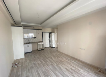 Выгодное предложение в Мерсине: новая двухкомнатная квартира, 55м², в Тедже, в 400м от моря. ID-10242 фото-2
