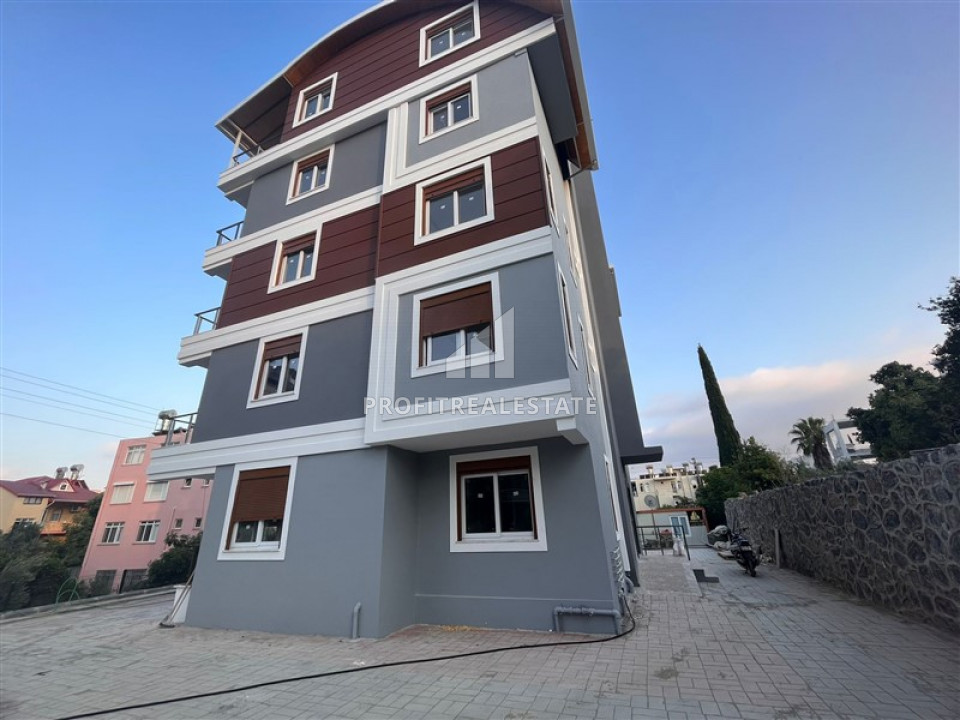 Двухкомнатная квартира, 55м², в доме городского типа в 1700м от моря в районе Газипаша, Алания ID-10287 фото-2