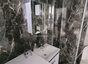 One bedroom apartment, unfurnished, 300 meters from the center of Mahmutlar, Alanya, 65 m2 ID-10302 фото-9