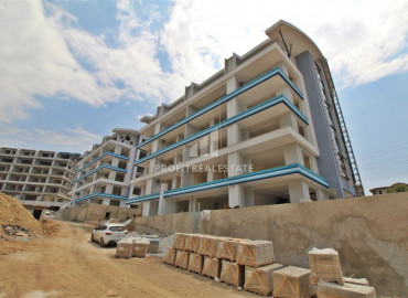 Двухкомнатная квартира, 60м², в комплексе на этапе строительства в 750м от моря, Аланья, Каргыджак ID-10307 фото-7